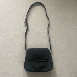 Coach black neoprene purse.